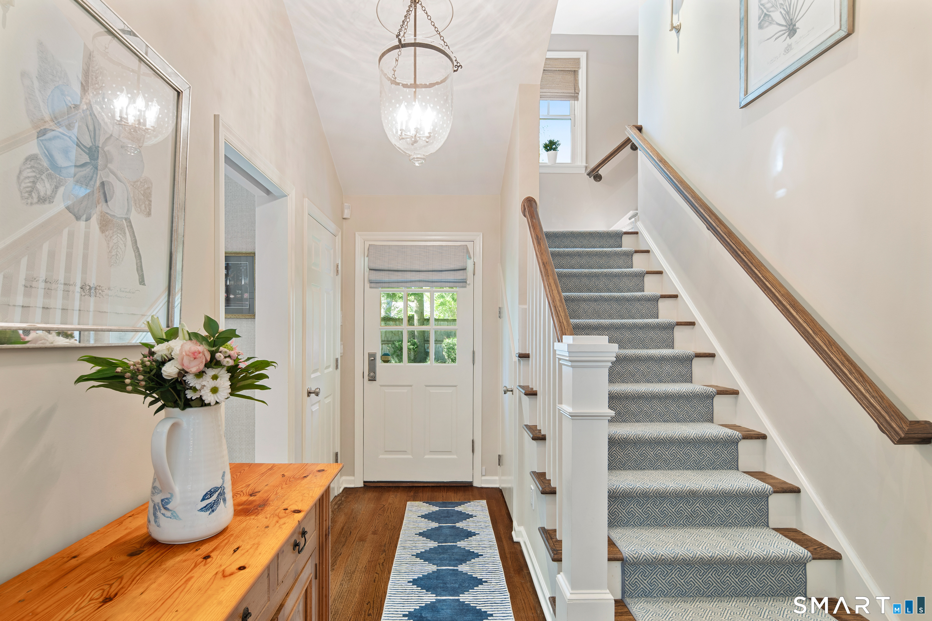 11 McLaren Road South Darien, CT 06820 - Photo 36 of 40 a view of entryway and hall with wooden floor
