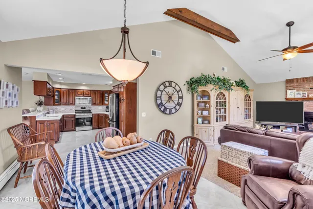 a view of a dining room with furniture