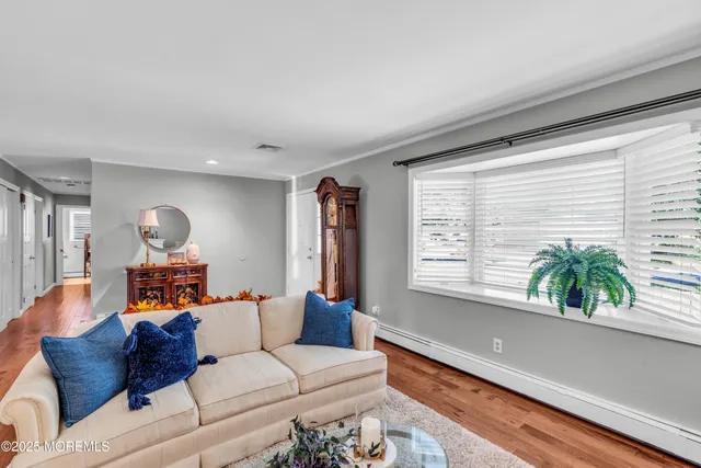 a living room with furniture and window