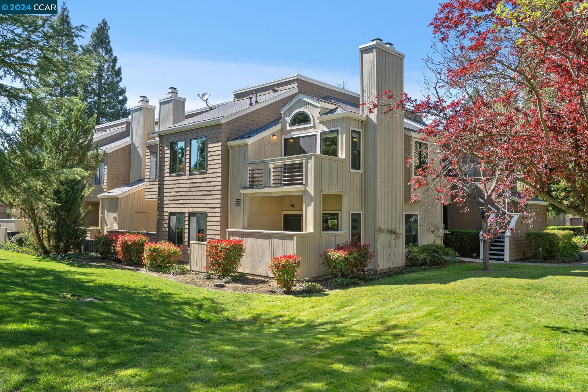 207 Copper Ridge Road San Ramon, CA 94582 - Photo 1 of 1 a front view of house with yard and green space