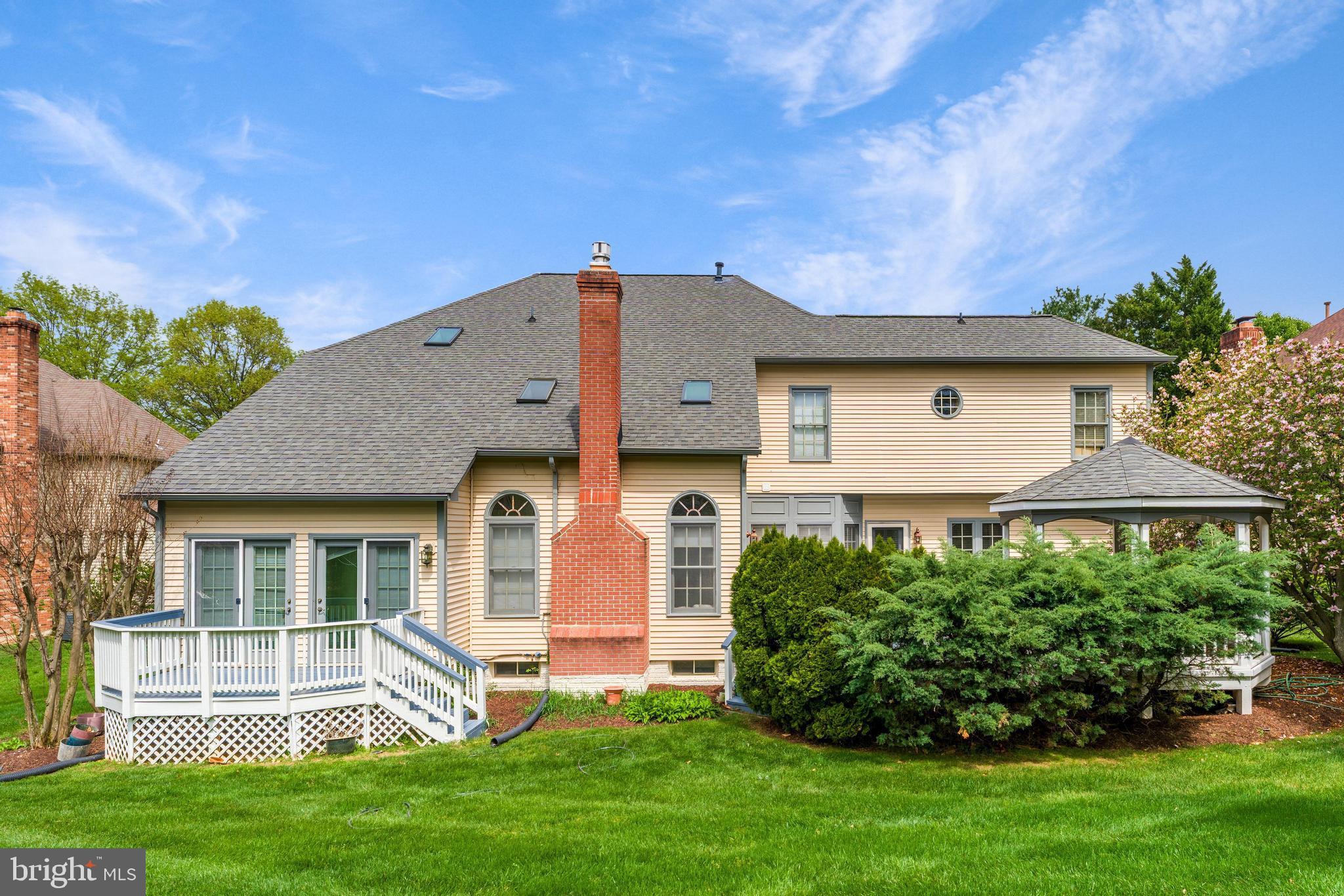 5501 Ashleigh Road Fairfax, VA 22030 - Photo 73 of 77 a front view of a house with a yard