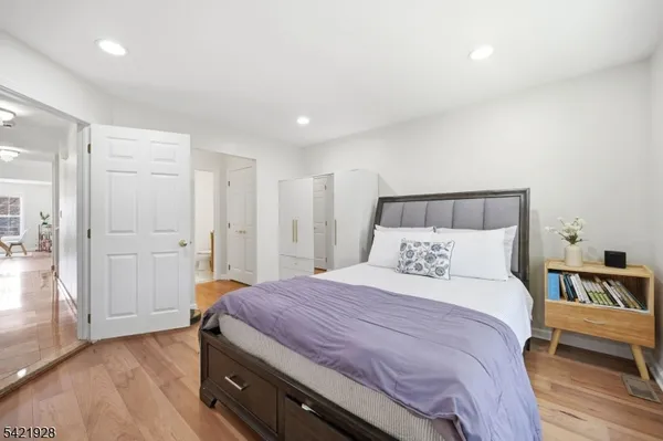 a view of a house with a backyard and a patio