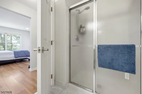 a view of a house with backyard sitting area and garden