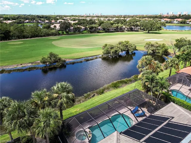 a view of a lake with a yard