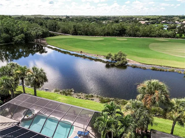 a view of a lake with a yard