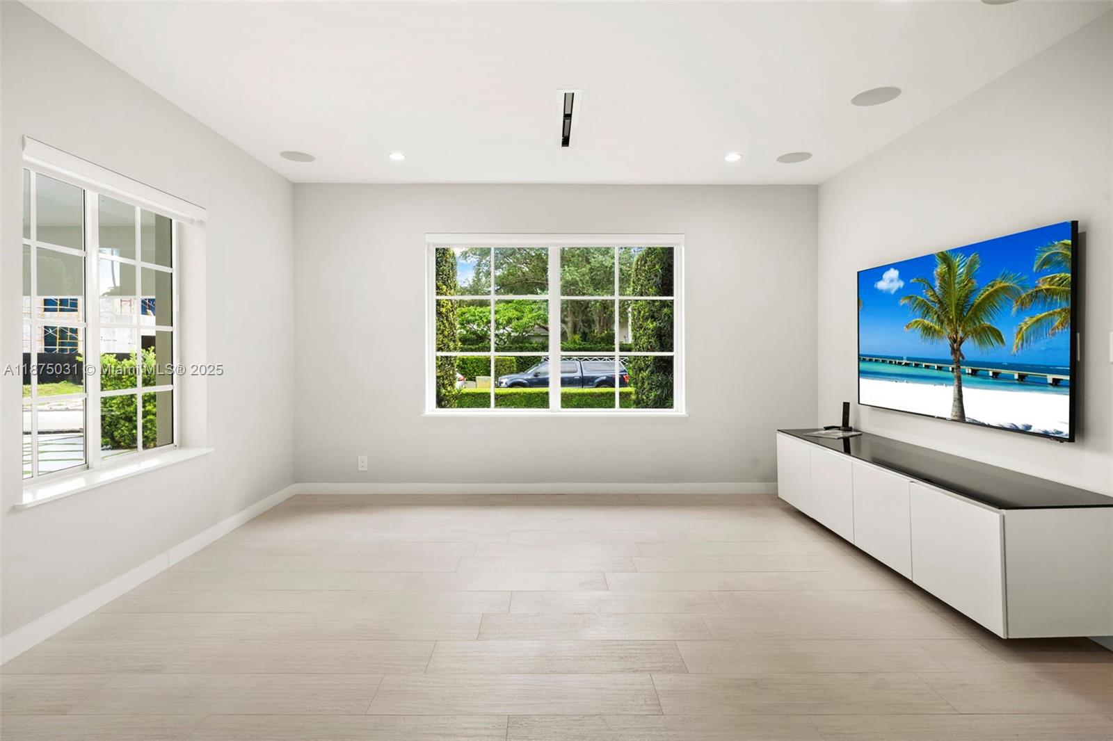 4380 Lake Road Miami, FL 33137 - Photo 14 of 61 a living room with furniture and a large window