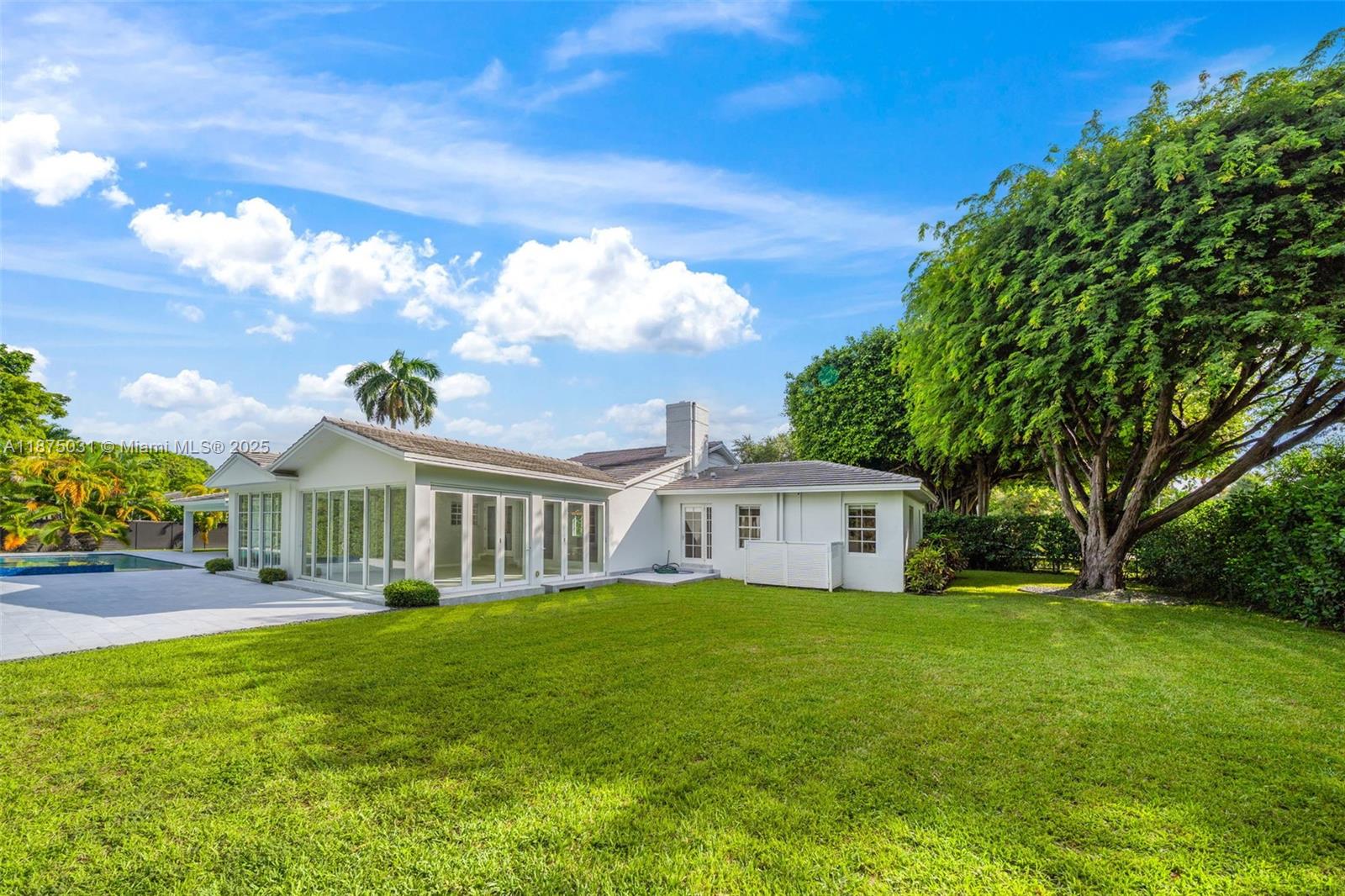 4380 Lake Road Miami, FL 33137 - Photo 15 of 61 a view of house with a big yard