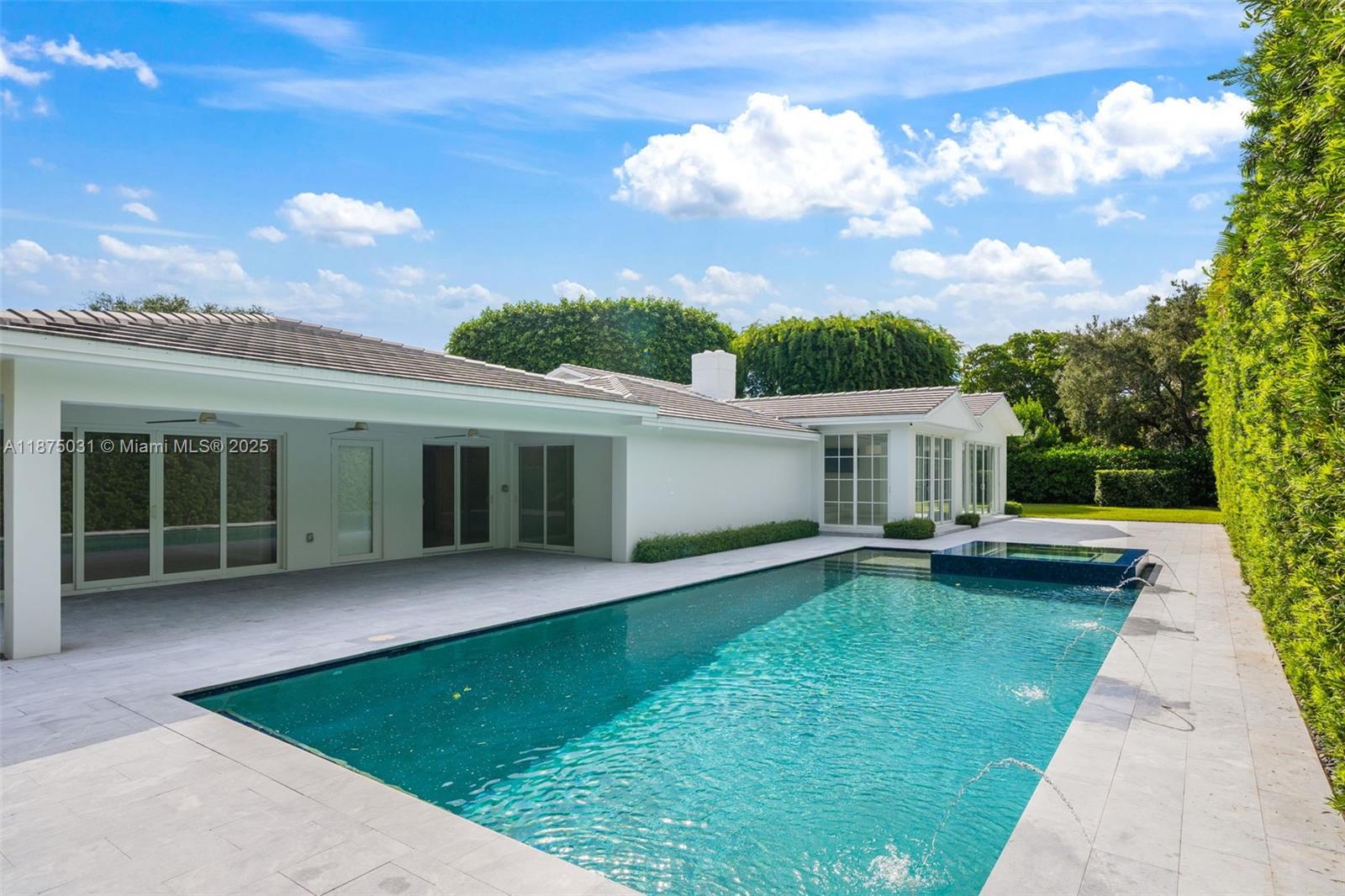 4380 Lake Road Miami, FL 33137 - Photo 18 of 61 a view of a house with a yard