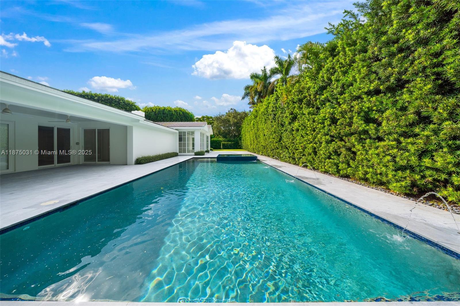 4380 Lake Road Miami, FL 33137 - Photo 19 of 61 a view of a backyard with a garden