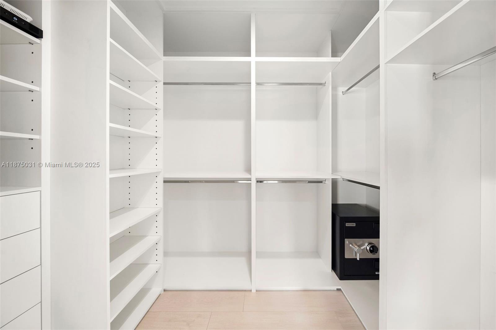 4380 Lake Road Miami, FL 33137 - Photo 38 of 61 a view of an empty walk in closet