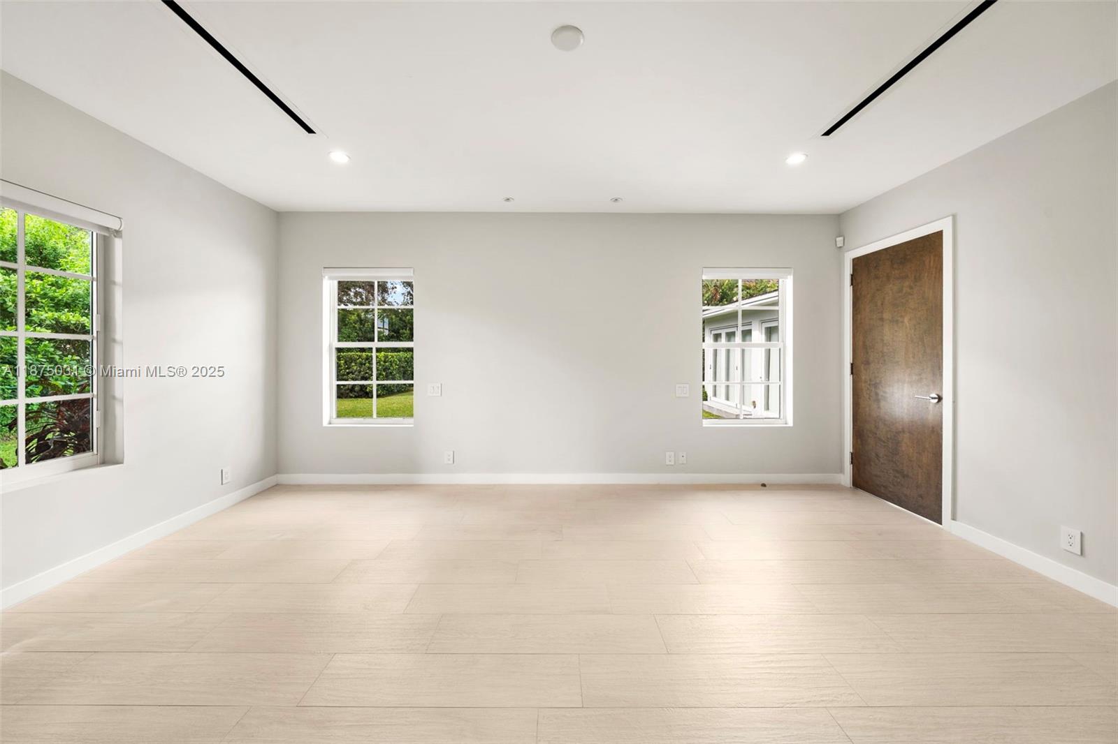 4380 Lake Road Miami, FL 33137 - Photo 39 of 61 a view of an empty room with a window