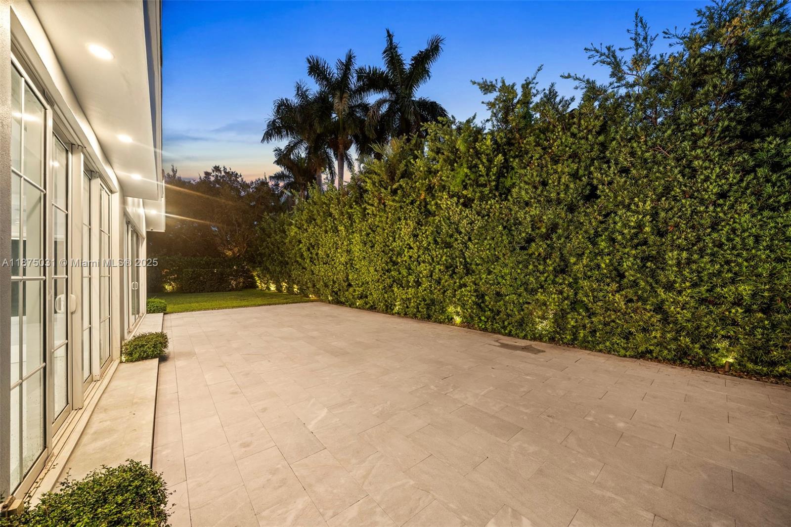 4380 Lake Road Miami, FL 33137 - Photo 50 of 61 a view of a backyard of a house