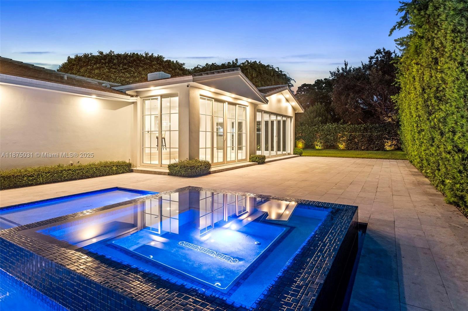 4380 Lake Road Miami, FL 33137 - Photo 52 of 61 a view of a balcony with chair and wooden floor
