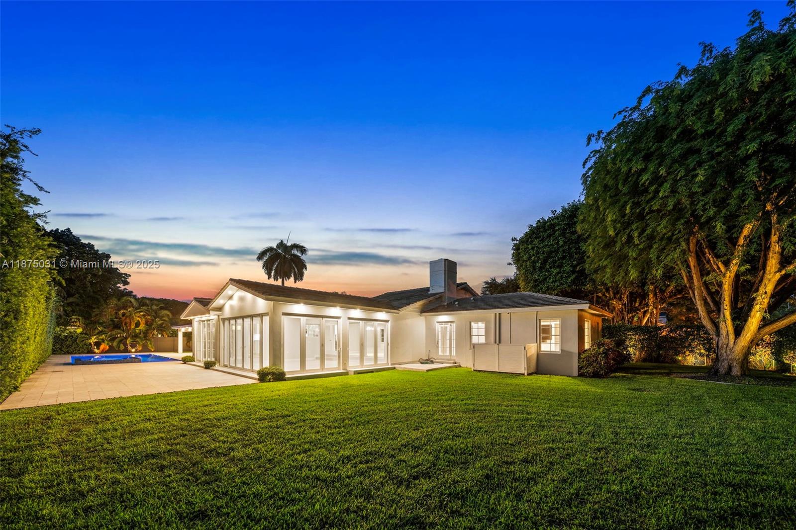 4380 Lake Road Miami, FL 33137 - Photo 55 of 61 a view of a house with backyard and garden