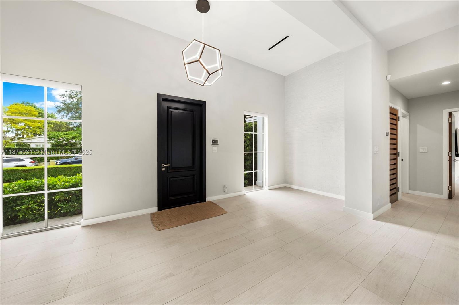 4380 Lake Road Miami, FL 33137 - Photo 9 of 61 a view of an empty room with a window