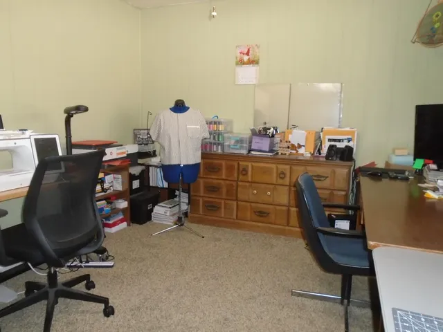 a room with furniture and a chair