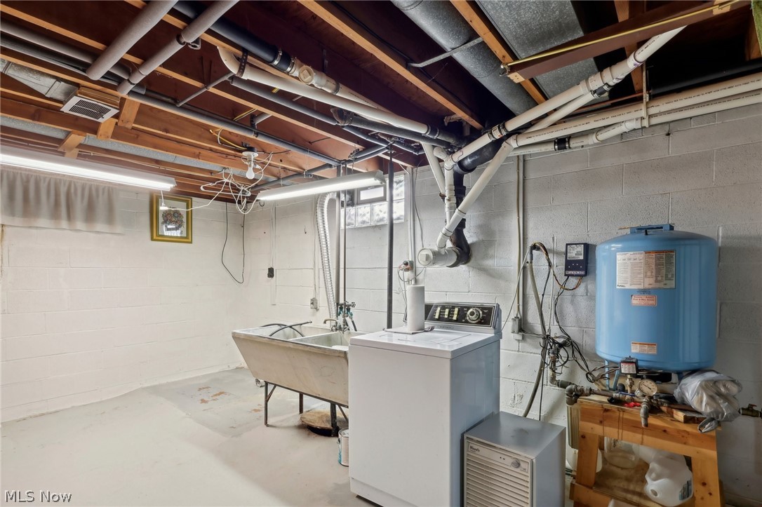 3873 Baumberger Road Stow, OH 44224 - Photo 34 of 50 Basement featuring sink and washer / dryer