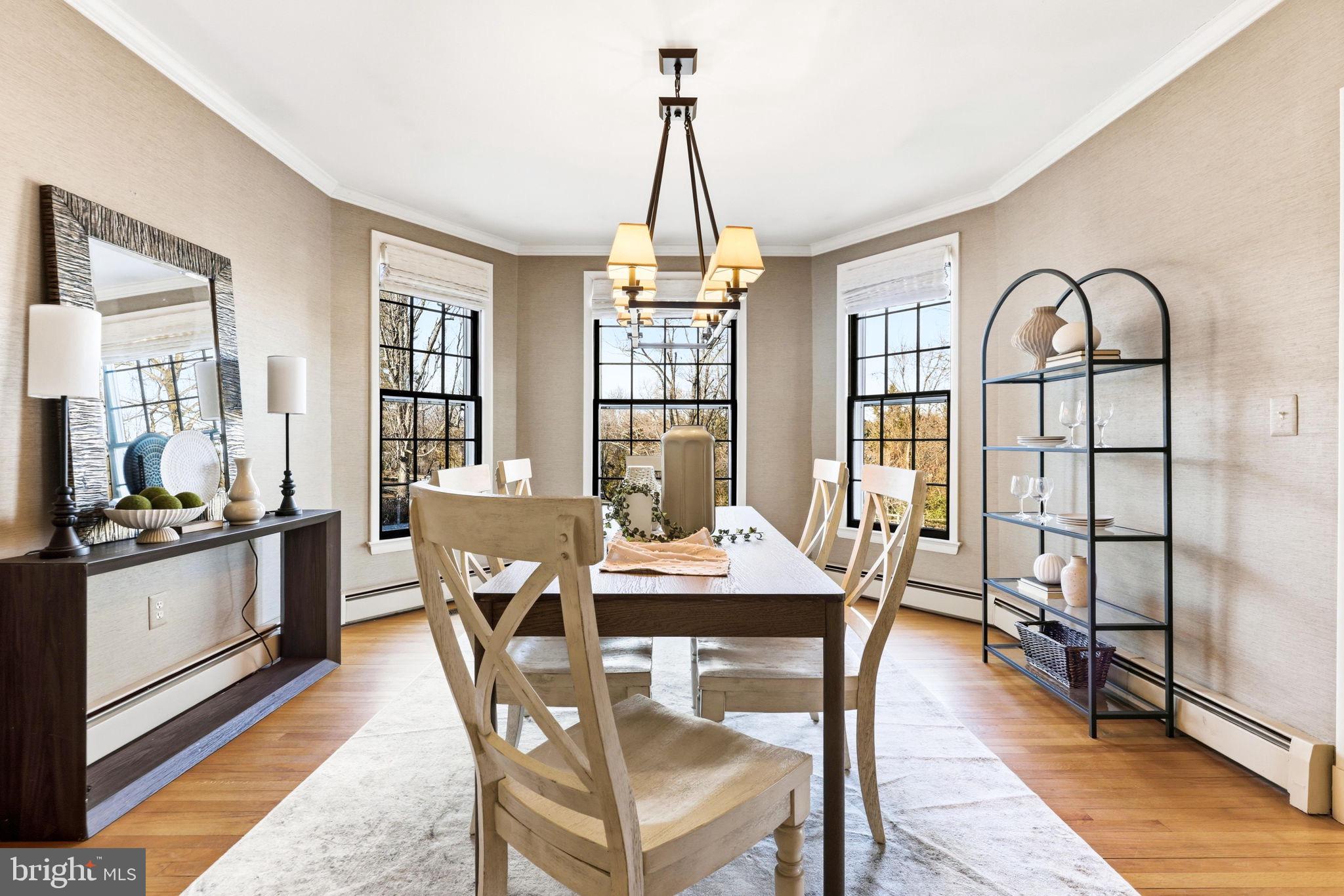 9101 Warfield Road Gaithersburg, MD 20882 - Photo 14 of 44 a view of a dining room with furniture window and outside view