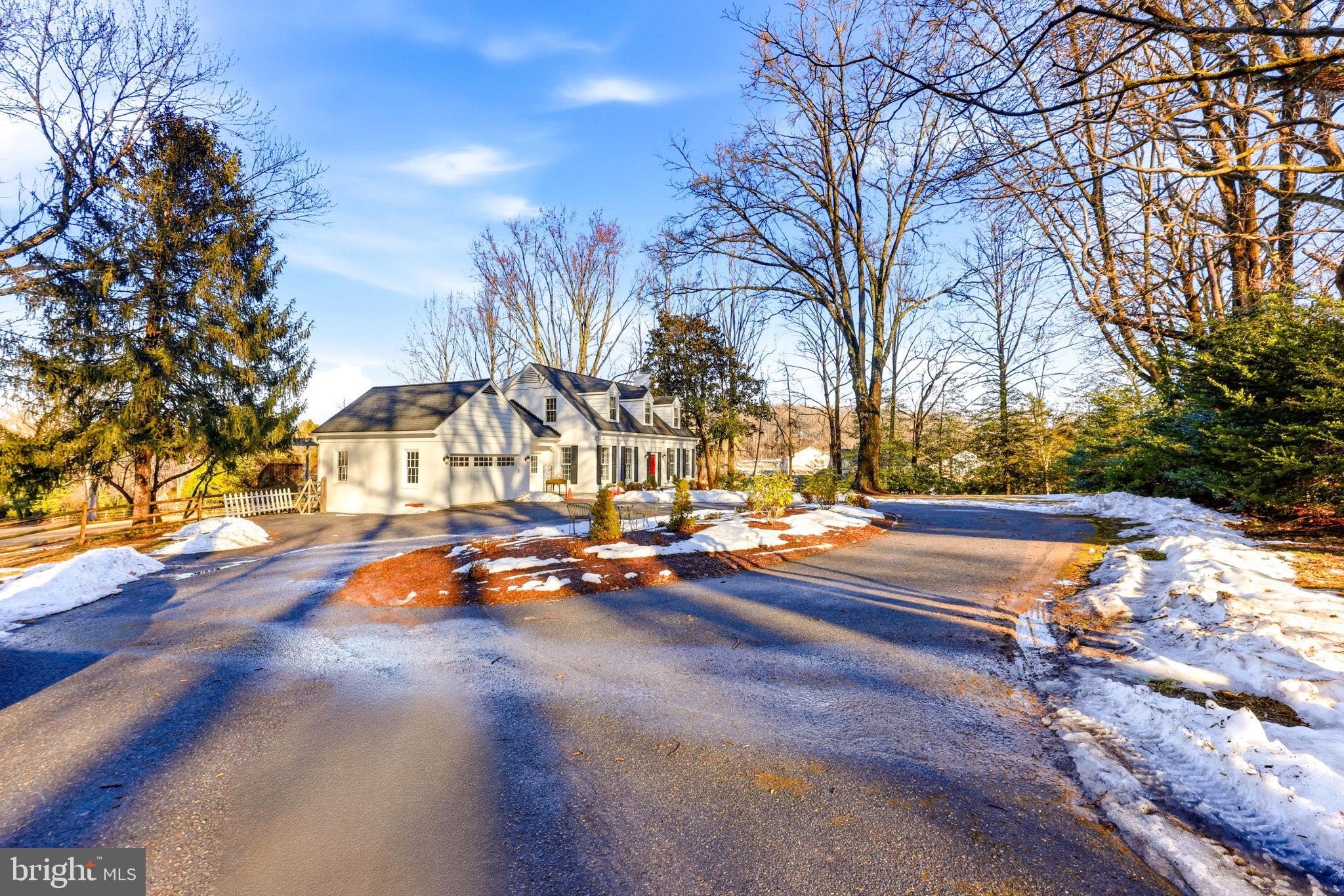 9101 Warfield Road Gaithersburg, MD 20882 - Photo 5 of 44 a view of a swimming pool with lounge chairs