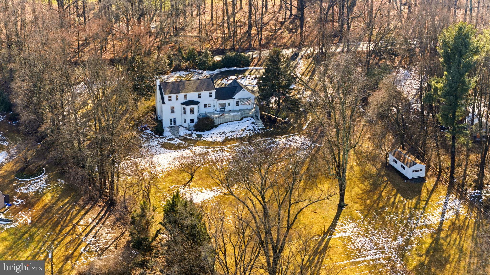 9101 Warfield Road Gaithersburg, MD 20882 - Photo 8 of 44 a view of a houses with yard