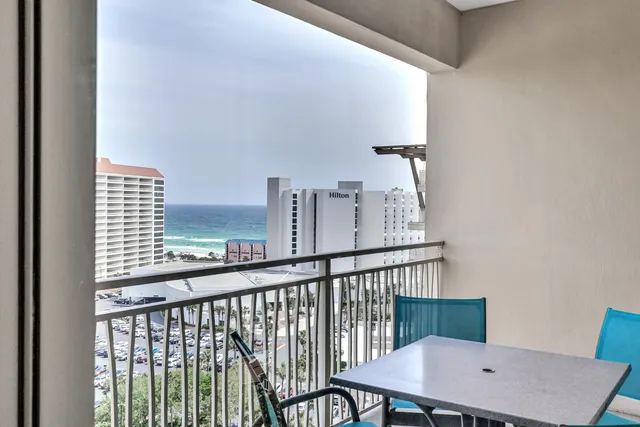 a kitchen with a table and chairs in it