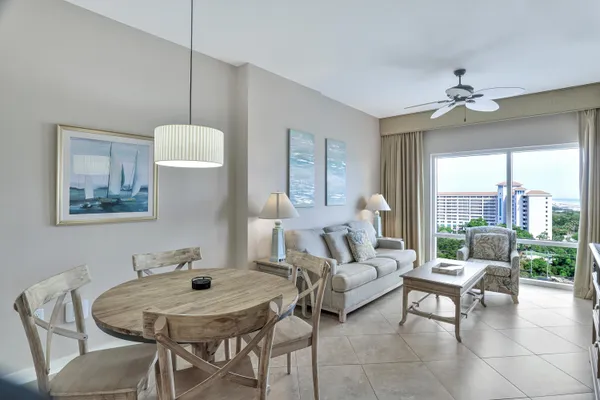 a kitchen with stainless steel appliances granite countertop a sink and a refrigerator
