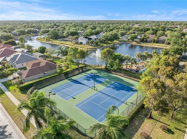 a view of a backyard with sitting area