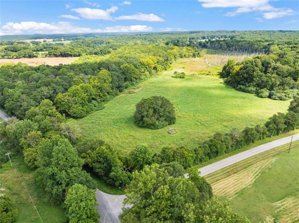 1542 Marlow Road Maysville, GA 30558 - Photo 17 of 35 a view of a lake with a city