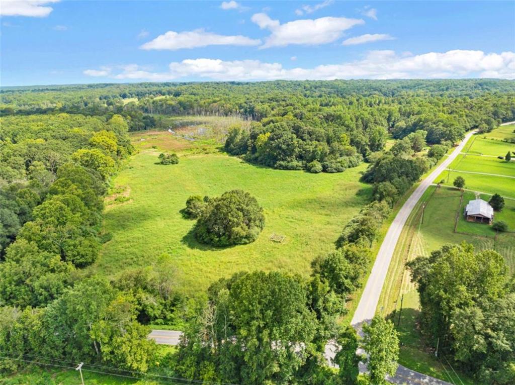 1542 Marlow Road Maysville, GA 30558 - Photo 18 of 35 a view of a lake with a city