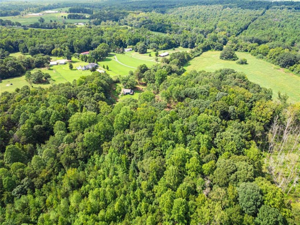 1542 Marlow Road Maysville, GA 30558 - Photo 23 of 35 an aerial view of a house with a yard