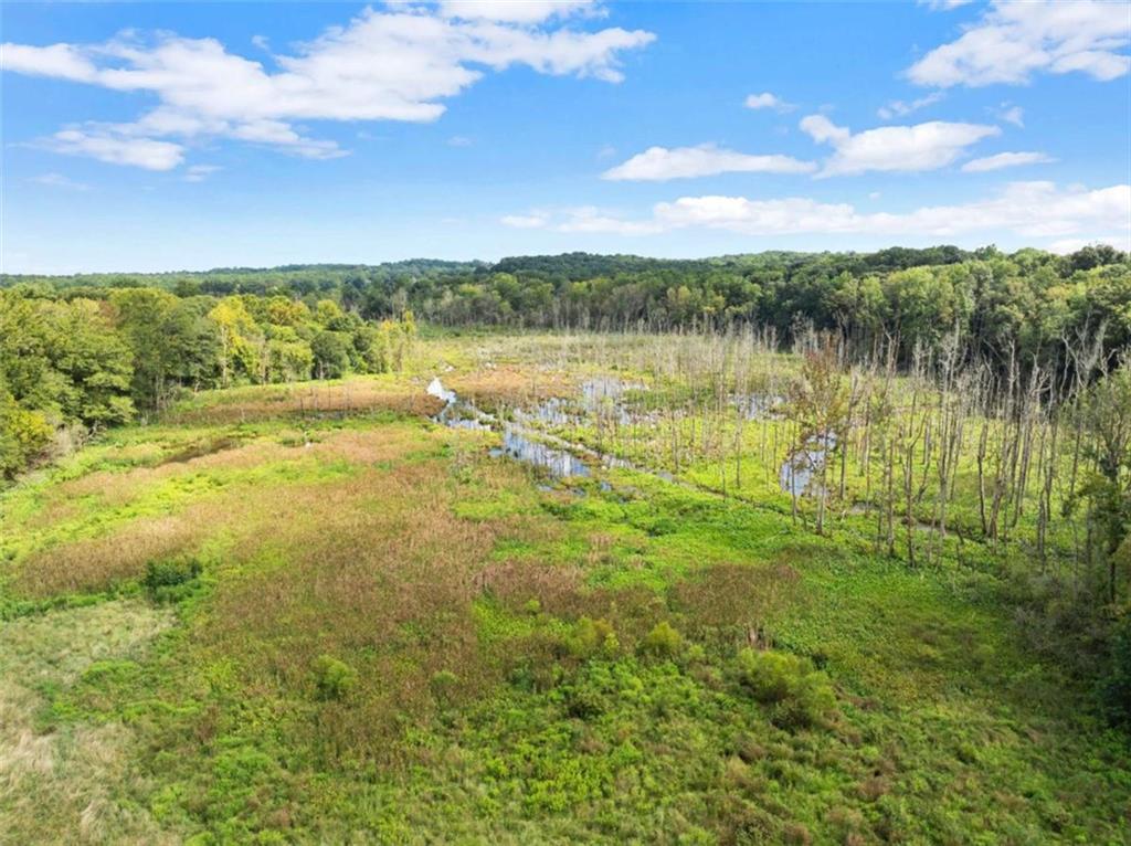 1542 Marlow Road Maysville, GA 30558 - Photo 33 of 35 a view of a lake with houses in the back