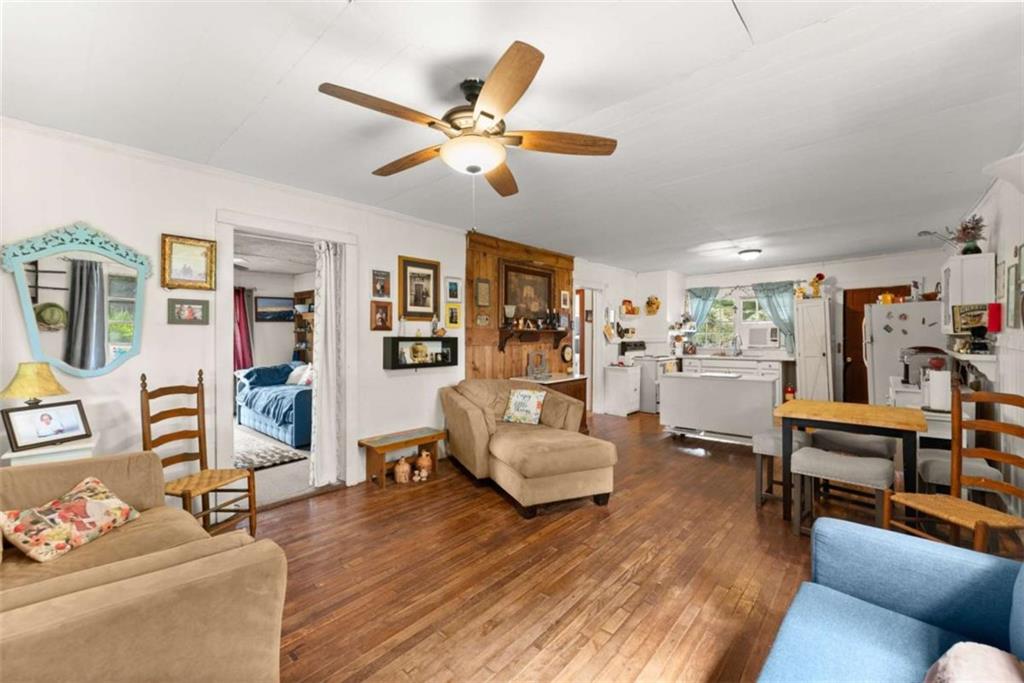 1542 Marlow Road Maysville, GA 30558 - Photo 5 of 35 a living room with furniture and wooden floor