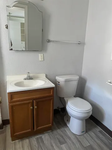 a kitchen with a refrigerator sink and stove