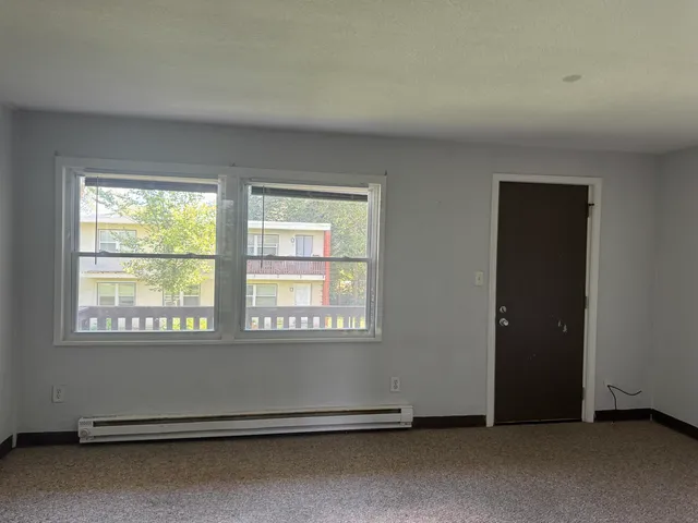 an empty room with a window