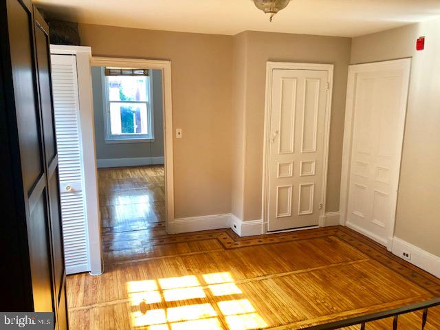 2021 Spring Garden Street, Unit 3F Philadelphia, PA 19130 - Photo 13 of 22 a view of an empty room with a empty space and a window