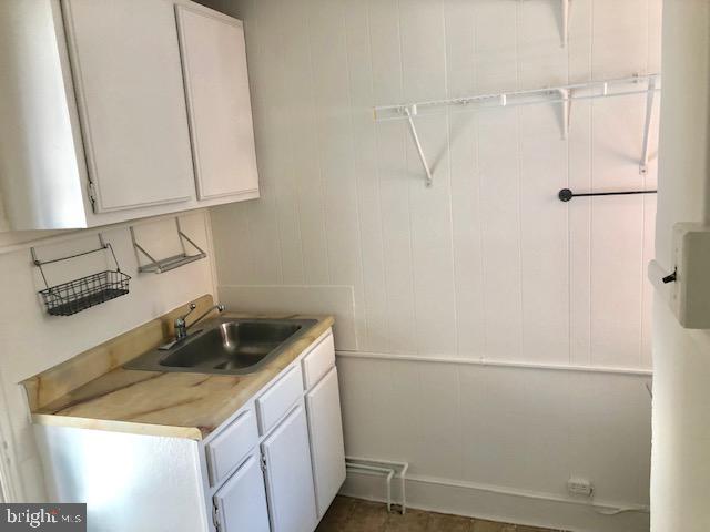 2021 Spring Garden Street, Unit 3F Philadelphia, PA 19130 - Photo 20 of 22 a utility room with dryer and washer