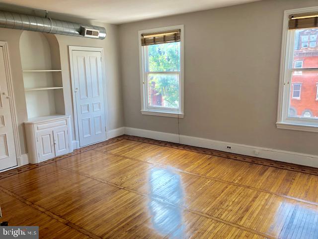 2021 Spring Garden Street, Unit 3F Philadelphia, PA 19130 - Photo 22 of 22 a view of empty room with wooden floor and fan