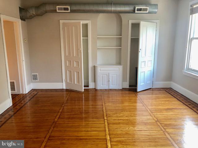 2021 Spring Garden Street, Unit 3F Philadelphia, PA 19130 - Photo 8 of 22 a view of an empty room and window