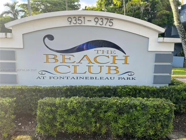 a sign that is on the side of a building