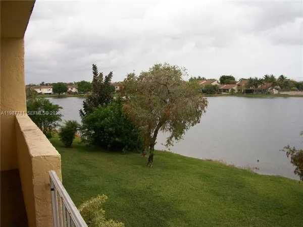 a view of a lake from a yard