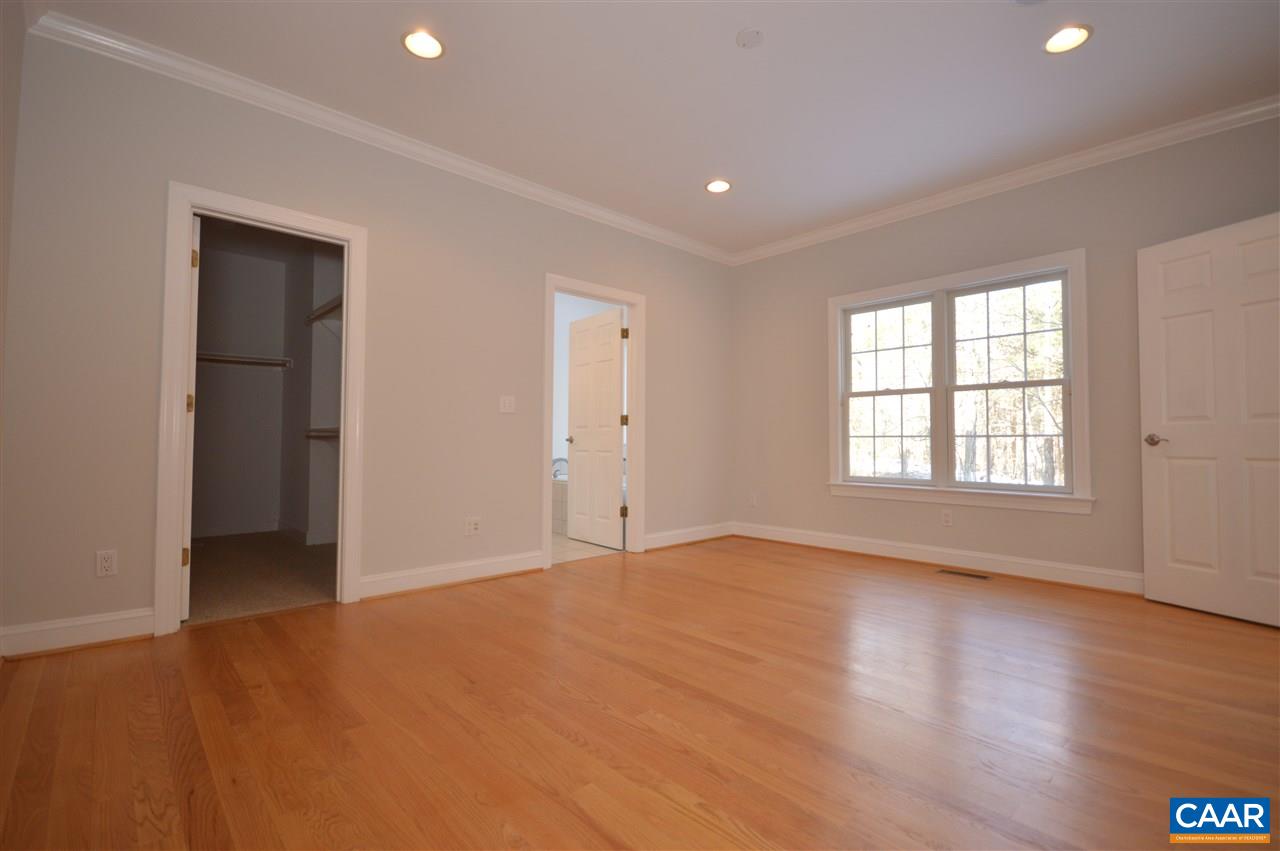 3308 Welsh Run Road Ruckersville, VA 22968 - Photo 13 of 39 a view of an empty room with wooden floor and a window
