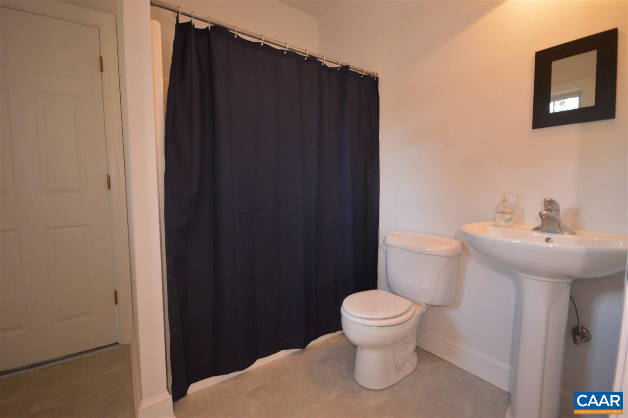 3308 Welsh Run Road Ruckersville, VA 22968 - Photo 19 of 39 a bathroom with a sink and a toilet
