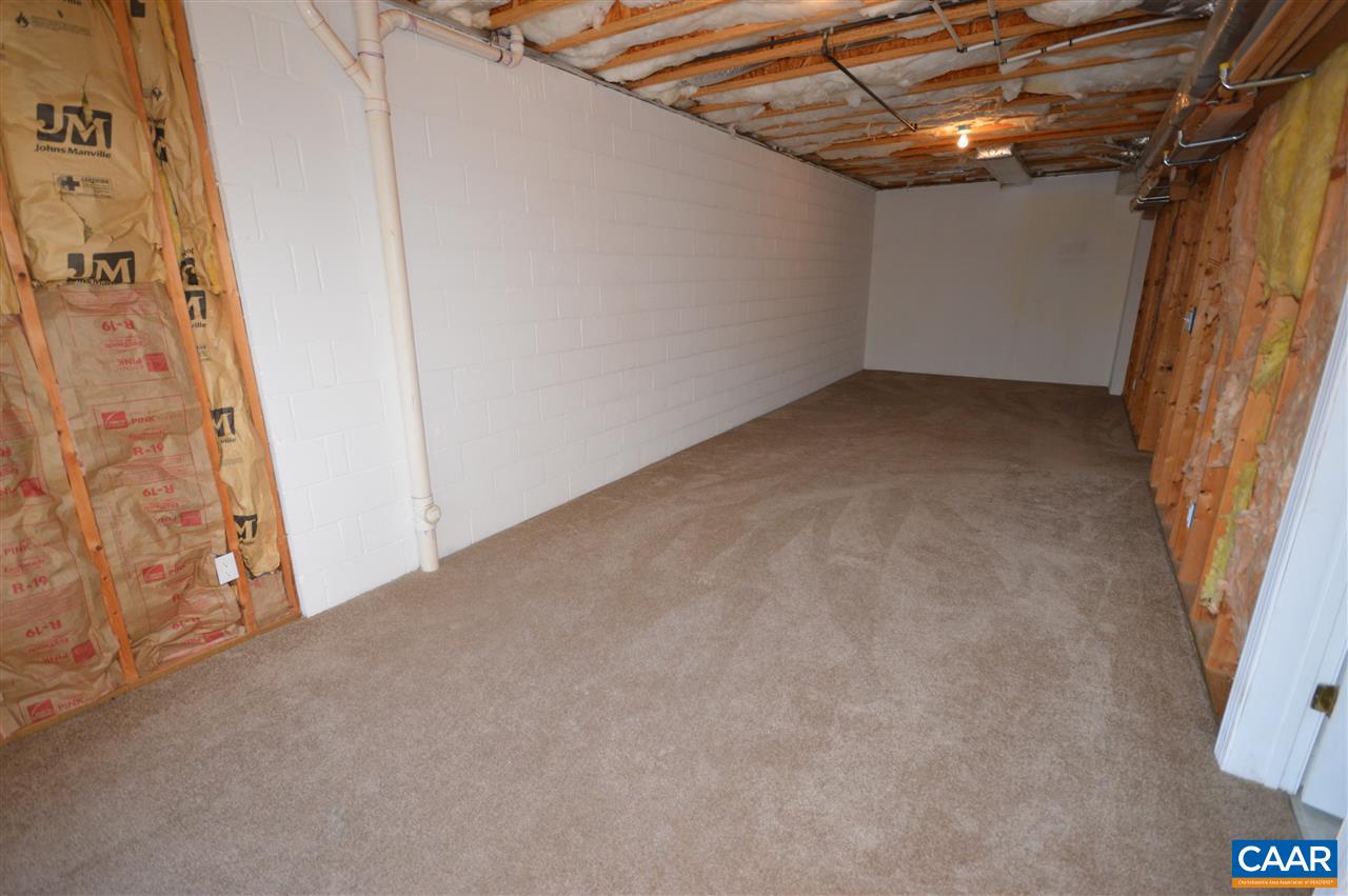 3308 Welsh Run Road Ruckersville, VA 22968 - Photo 20 of 39 a view of a room with racks on the wall