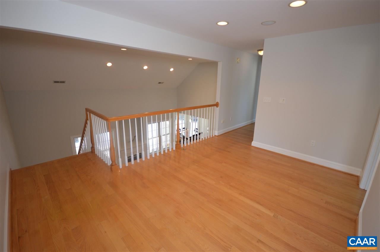 3308 Welsh Run Road Ruckersville, VA 22968 - Photo 22 of 39 a view of an empty room with wooden floor