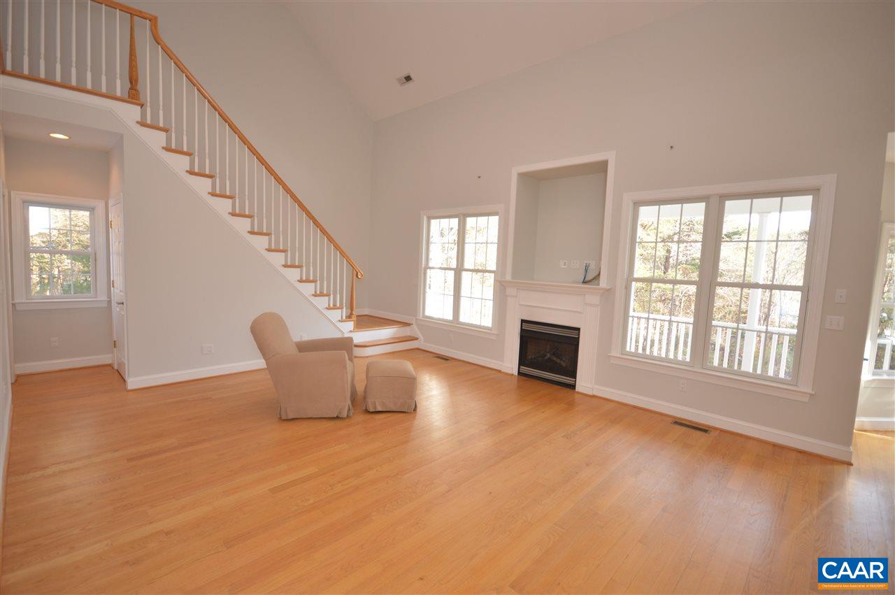 3308 Welsh Run Road Ruckersville, VA 22968 - Photo 3 of 39 a view of a livingroom with furniture staircase and windows