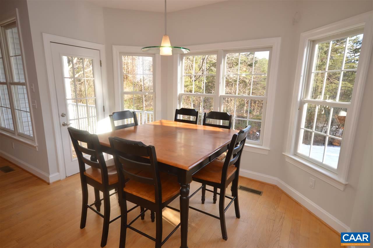 3308 Welsh Run Road Ruckersville, VA 22968 - Photo 6 of 39 a dining room with furniture window wooden floor