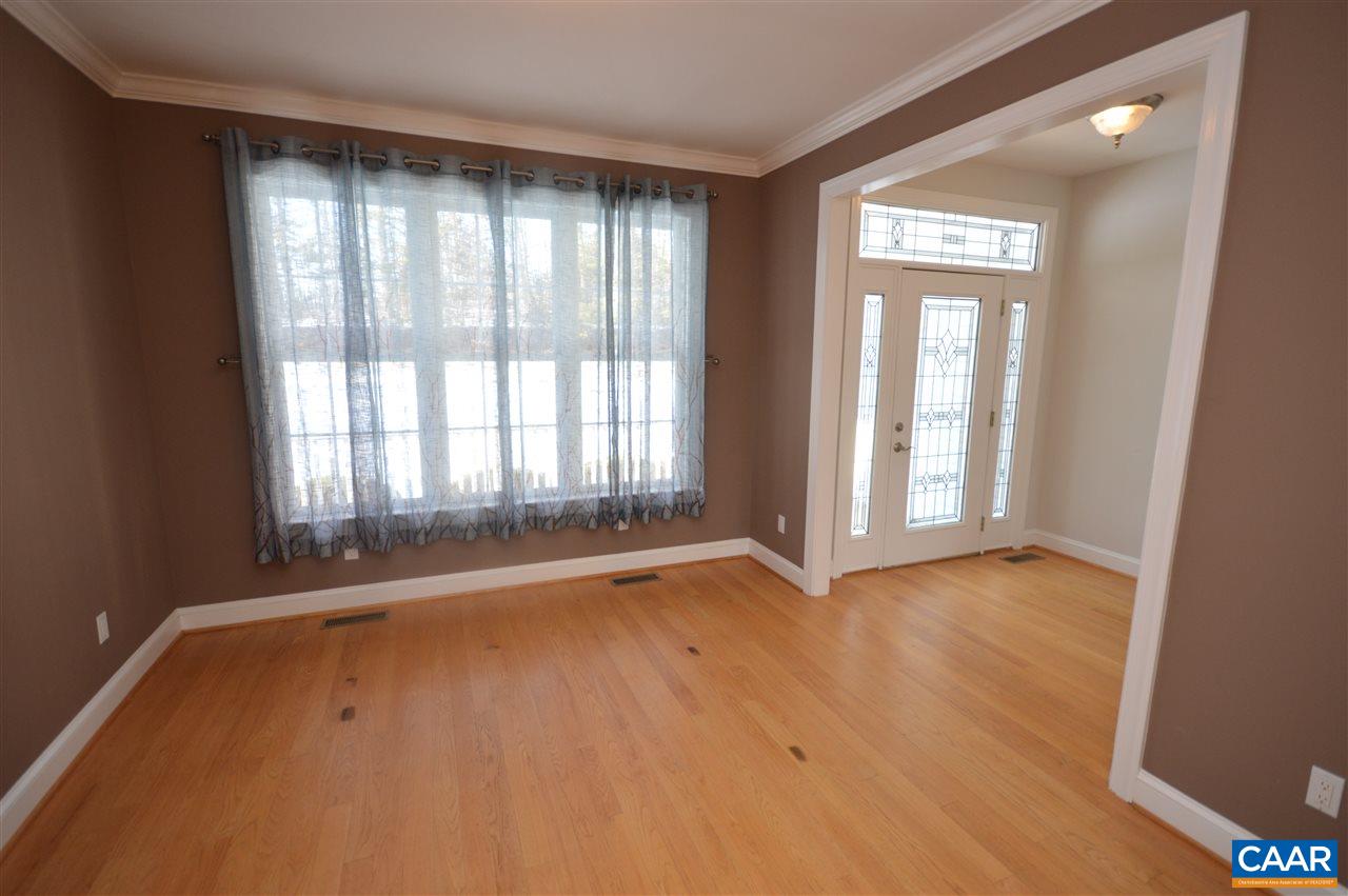3308 Welsh Run Road Ruckersville, VA 22968 - Photo 10 of 39 a view of an empty room with a window and wooden floor