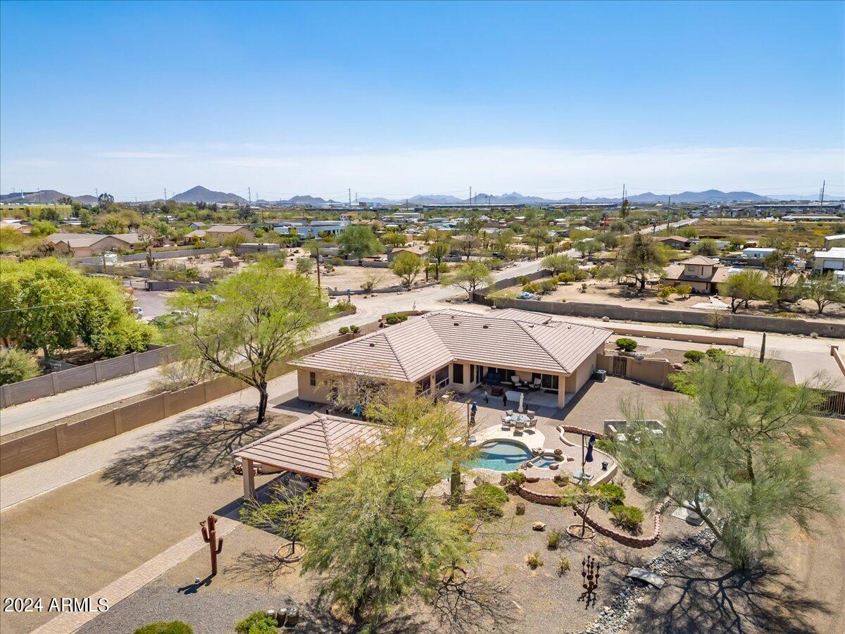 1706 West Parsons Road Phoenix, AZ 85085 - Photo 11 of 58 an aerial view of residential houses with outdoor space