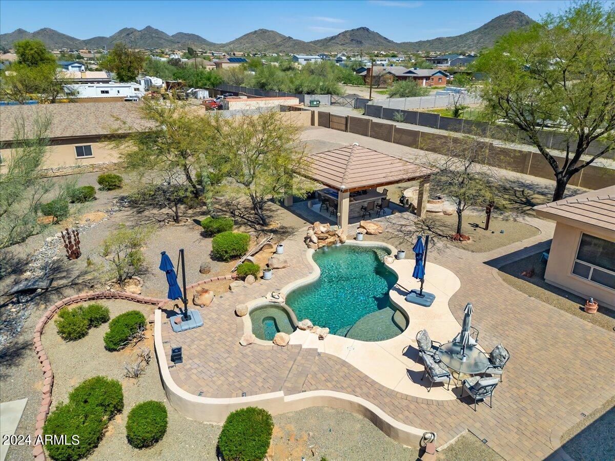 1706 West Parsons Road Phoenix, AZ 85085 - Photo 15 of 58 an aerial view of a house with yard swimming pool and outdoor seating