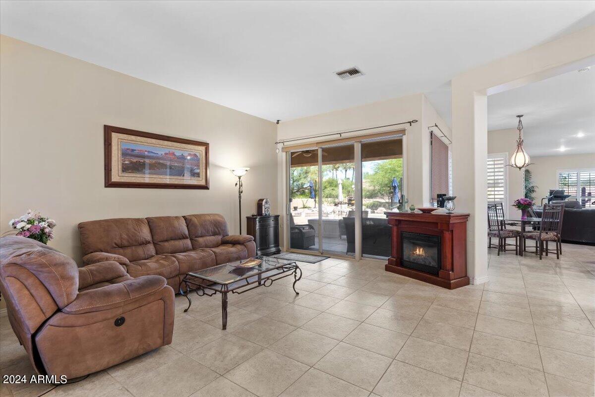 1706 West Parsons Road Phoenix, AZ 85085 - Photo 20 of 58 a living room with furniture and a large window